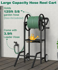 Two Wheel Hose Reel Cart Heavy Duty Powder Coated Steel Backyard Outdoor Water Hose Holder For Up To 125 Feet Of Five Eighth Inch Hoses With Basket And Three Point Nine Foot Leader Hose Black shown on patio