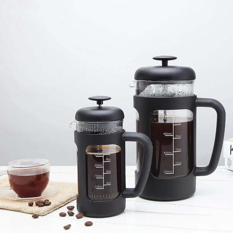 12 Oz French Press Coffee And Tea Maker With Borosilicate Glass Carafe And Soft Grip Handle shown with coffee brew