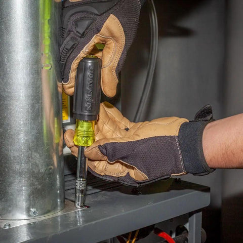 Technician using 8 In 1 Magnetic Screwdriver And Nut Driver With Sliding Head For HVAC Quick Change in tight space