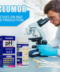 Daily PH Test Strips for Urine and Saliva 200 Strips to Track Your Body Acidic and Alkaline Balance Easy Litmus Paper next to microscope