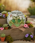 Frog Garden Stepping Stone With Welcome Friends Message, 1.2 Inch Low Profile Concrete Plaque in garden setting with flowers.
