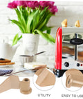 Stirring Paddle Replacement For Bread Maker No Fuss Kneading Paddle With Serrated Edge beside a toaster in kitchen setting