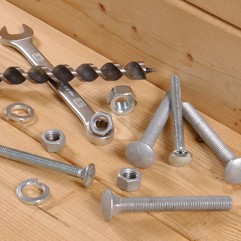 Workhorse Carriage Bolts 3/8 By 5 1/2 Inch Zinc Plated Steel fasteners, assorted nuts, and tools on wood surface.