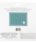 Back of packaging for Trimmer And Magnetic Cutting Mat Kit 7x5 Self Healing Craft Mat With Mini Ruler For Pro Grade Precision Measurements