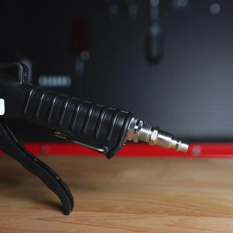Close-up of the handle and nozzle of the Slick Radiator Flush Kit Gun With Garden Hose Quick Connect for Automotive Coolant.