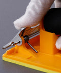 Close-up of Two Pack Sandpaper Holder with Sponge Grip in use, showcasing strong bite spring clamp on durable hand sander block.