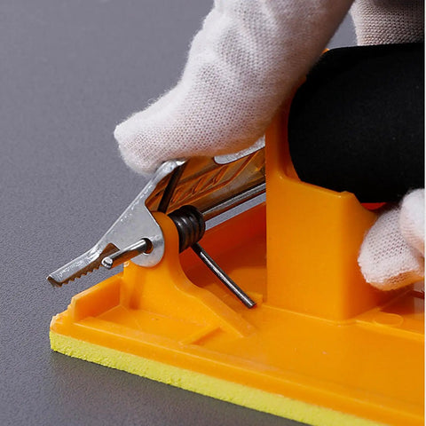 Close-up of Two Pack Sandpaper Holder with Sponge Grip in use, showcasing strong bite spring clamp on durable hand sander block.