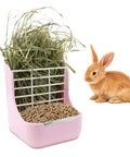 Super Cool Pink Two In One Rabbit Hay Feeder With Automatic Guinea Pig Food Bowl And Quick Release Grass Rack filled with hay and food next to a bunny.