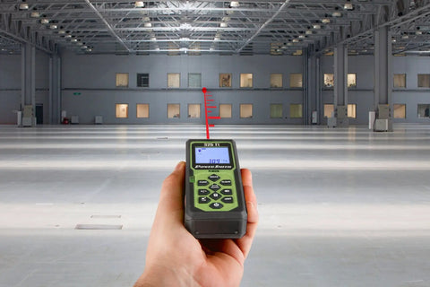 Pro Grade Laser Distance Meter 325 Ft in hand, displaying reading, ideal for indoor measurements and home renovation projects.