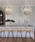 Dope Modern 4 Light Globe Chandelier In Brushed Nickel, Adjustable Height With 59in Wire And Chain in kitchen setting