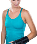 Person wearing Quick Fit II Left Wrist Support Brace One Size Fits Most Easy Fit Immobilizer With Single Pull Lacing And Dorsal Stay Pod.