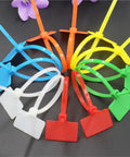 Rock Solid 100 Pack Nylon Self Locking Cable Ties With Write On Labels in assorted colors arranged for easy identification.