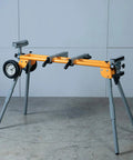 Set Of Two Miter Saw Stand Mounting Brackets For MT4000 Stand OEM Replacement Tool Mounts attached to yellow and grey stand