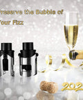 2 Pack Champagne Stoppers With Built In Vacuum Pump Black next to champagne glasses and cork, with glitter background.