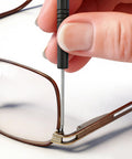 Person using Eyeglass Repair Kit With 15 Screw Types For Eyeglasses Including Frame Screws, Hinge Screws, Nose Pad Screws, Nuts And Washers