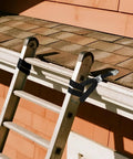 Heavy Duty Ladder Safety Strap With Anchor Plate And Stainless Clip For Anti Slip Pole Strap On Rooftop Work shown installed on a ladder.
