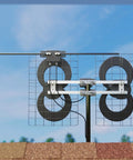 ClearStream 4V Indoor Outdoor TV Antenna with 70+ Mile Range mounted on roof, showing multi-directional UHF VHF reception design