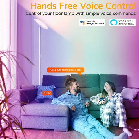 Couple using Smart RGB Floor Lamp With Alexa And Google Home WiFi, Tall Modern Torchiere Standing Lamp in a living room.