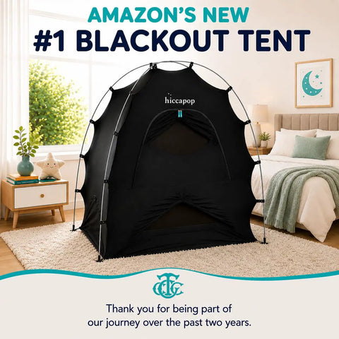 Portable Blackout Tent For Pack And Play Sleep Pod That Blocks 98 Percent Of Light displayed in a cozy bedroom setting.