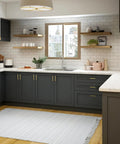 Modern kitchen with gray cabinets featuring 30 Pack 5 Inch Stainless Steel Cabinet Handles Square Cabinet Pulls Brushed Brass Hardware.