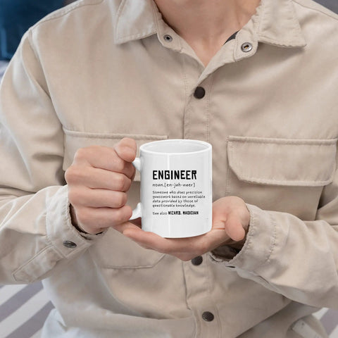Person holding Engineer Definition Funny Gift Mug For Engineering Students Teachers And Pros Nerdy Computer Civil Mechanical Electrical Software Engineers 11 Oz White Ceramic Coffee Mug