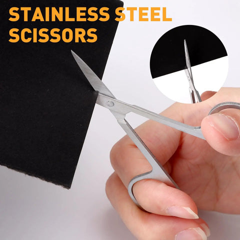 Close-up of cutting black paper with stainless scissors from All In One Vinyl Weeding Toolkit For DIY Crafters, 33-Piece Set.