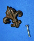 Old School Vintage Fleur De Lis Cabinet Knob with screw, brown cast iron, Victorian style, 2 1/4 in tall x 2 in wide.