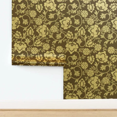 Premium Brown Gold Metallic Wallpaper With Block Print And Textured Finish For Modern Home Decor on wall with floral design.