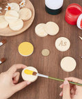 Unfinished Wooden Circles Craft Blanks, Smooth Two Inch Plywood Discs For Diy Painting And Woodburning with paintbrush.