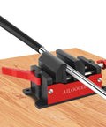 Instant Release Golf Club Vise Clamp For Aluminum Table Vise Woodworking Rubber Clamp Secure Hold With Quick Release Shaft Removal Tool And Easy Grip Adjustments mounted on wooden table with golf club.