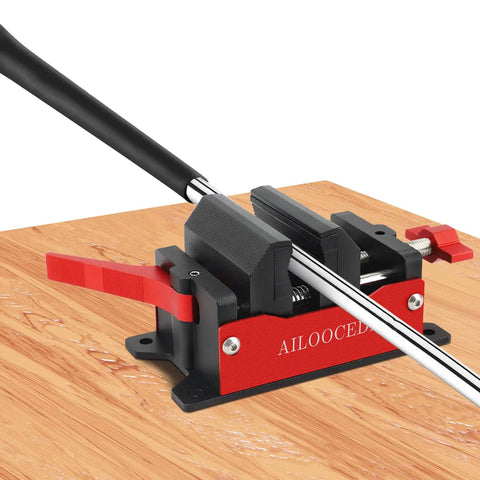Instant Release Golf Club Vise Clamp For Aluminum Table Vise Woodworking Rubber Clamp Secure Hold With Quick Release Shaft Removal Tool And Easy Grip Adjustments mounted on wooden table with golf club.