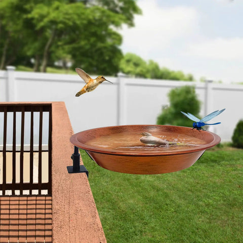 Heavy Duty Iron Bird Bath For Railing And Balcony Deck with hummingbird and dragonfly in a backyard setup.