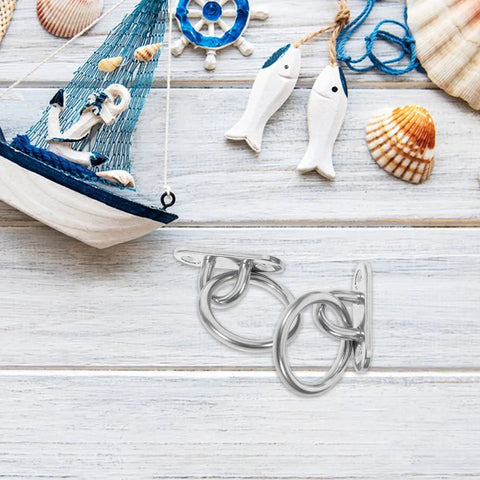 Rock Solid Stainless Steel Pad Eye Plates And Heavy Duty Mounting Rings With M5 Threads for marine rigging, shown on light wooden background.