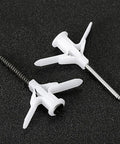 Close-up of 400 Piece Drywall Anchors Kit Self Drilling Butterfly Shaped Wall Anchors with screws on black background.
