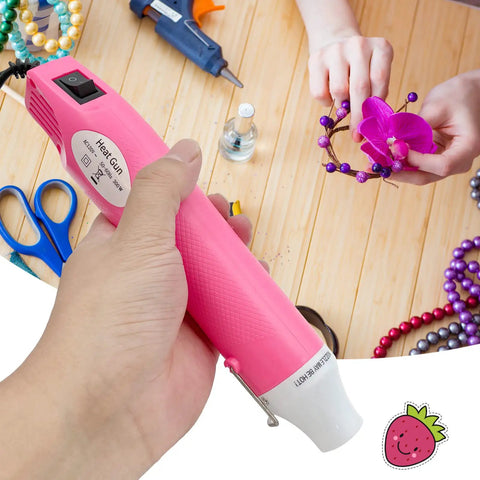 Person using Mini Hot Air Gun Handy For DIY Crafts Portable Heat Gun Tool For Embossing Shrink Wrapping Drying Paint And More Lightweight