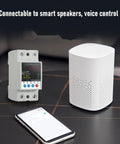 Slick Outdoor Smart Wifi Circuit Breaker With Dead Simple Smartphone App Remote Control And Real Time Monitoring For No Sweat Home Or Industrial Power Management 63A Adjustable Electrical Switch beside white smart speaker and smartphone.