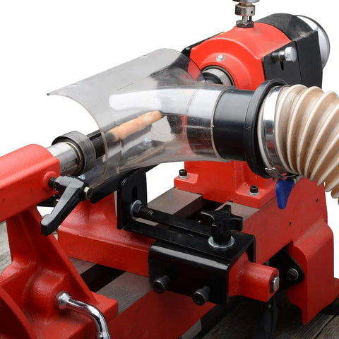Pen Making Dust Trap For Wood Turning Compact Circular Catcher With 3 Inch Opening Catches Dust And Chips At The Source Tailstock Friendly Setup Clear PVC See Through Shell For Easy Workpiece Visibility mounted on red lathe