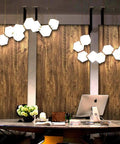 Wood Grain Peel And Stick Wallpaper For Countertops And Cabinets Waterproof Easy To Clean Self Adhesive Removable Vinyl Roll Rustic Brown Yellow 17.7 Inch Wide By 78.7 Inch Long DIY Friendly No Mess Kitchen Remodel covering walls behind a modern desk with hexagonal lights