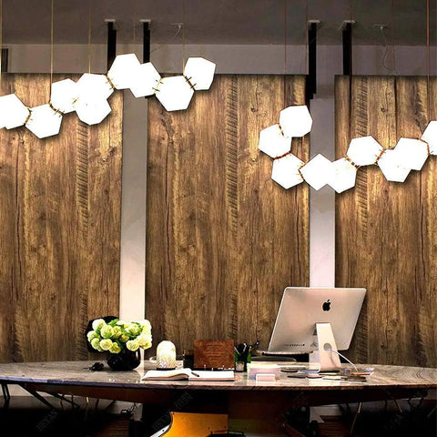 Wood Grain Peel And Stick Wallpaper For Countertops And Cabinets Waterproof Easy To Clean Self Adhesive Removable Vinyl Roll Rustic Brown Yellow 17.7 Inch Wide By 78.7 Inch Long DIY Friendly No Mess Kitchen Remodel covering walls behind a modern desk with hexagonal lights