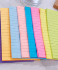 Colorful 4x6 Inch Sticky Notes, Eight Bright Colors, 320 Sheets Total Across Eight Pads, Mega Sticky Adhesive displayed on a table