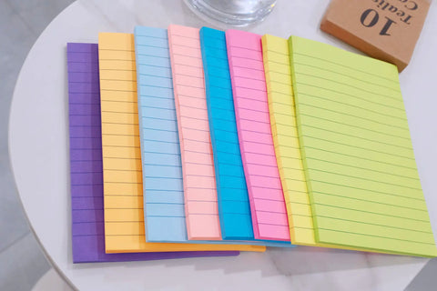 Colorful 4x6 Inch Sticky Notes, Eight Bright Colors, 320 Sheets Total Across Eight Pads, Mega Sticky Adhesive displayed on a table