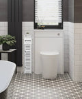 Slim Over Toilet Storage Cabinet For Small Bathrooms next to a modern toilet in a tiled bathroom.