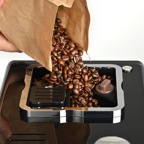 Top Notch Automatic Espresso And Coffee Machine With Built In Grinder pouring fresh coffee beans into hopper.