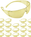 Rugged Safety Glasses Featuring Self Adjusting Flex Temples And Anti Fog Amber Lenses Built Different For Construction Sites And Daily Work Grinds In A Dependable Twenty Pack, showcasing a pair with multiple others in the background.