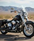 Universal Black Synthetic Leather Throw Over Motorcycle Saddlebags With Quick Release Buckles Waterproof Durable Panniers For Cruiser Touring Sport Chopper And Adventure Bikes mounted on a parked motorcycle