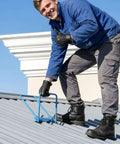 Worker using Heavy Duty Standing Seam Roofing Tool Metal Bender 13 X 7.9 Inch on metal roof for sheet metal work