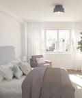 Bedroom with Indigo Blue Flush Mount Ceiling Light With Dimmable Modern Bell Shade and sleek decor