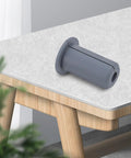 Kick Your Clutter To The Curb With These 6 Pcs Silicone Cable Grommets For Easy Wall Hole Coverage And Smart Wire Concealing In Homes Or Offices. Grey silicone cable grommet on desk hole