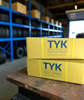 2-Pack Beefy Heavy Duty ATV Inner Tubes For 26x8-12, 26x9-12 And 26x10-12 With TR6 Metal Valve Stems boxes on a table