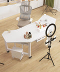 Heavy Duty Rolling Computer Desk With Slick Waterproof Top And Rock Solid Steel Frame Built Different For Ergonomic Gaming Rigs And Home Office Setups With Smooth Glide Wheels In Black on a wooden floor with decor.